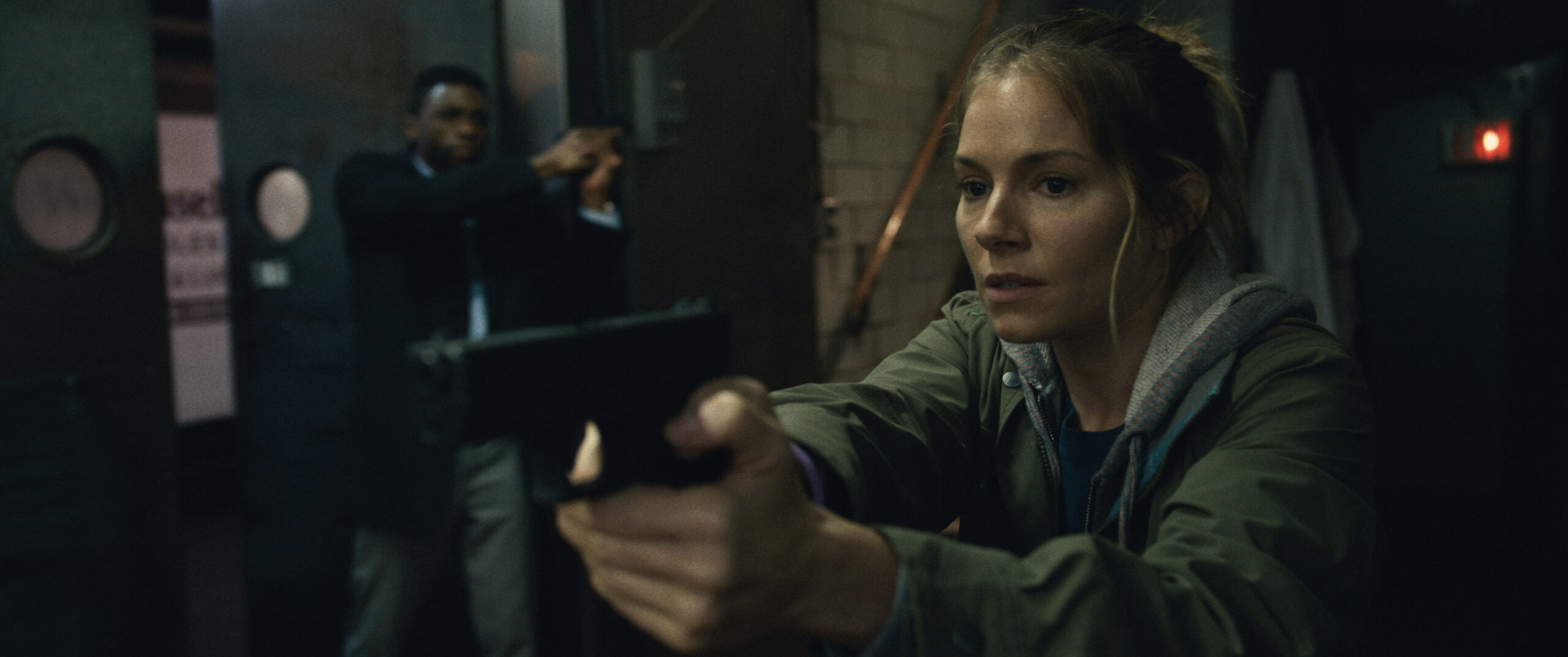 Sienna Miller stars in 21 BRIDGES
Courtesy of STXfilms